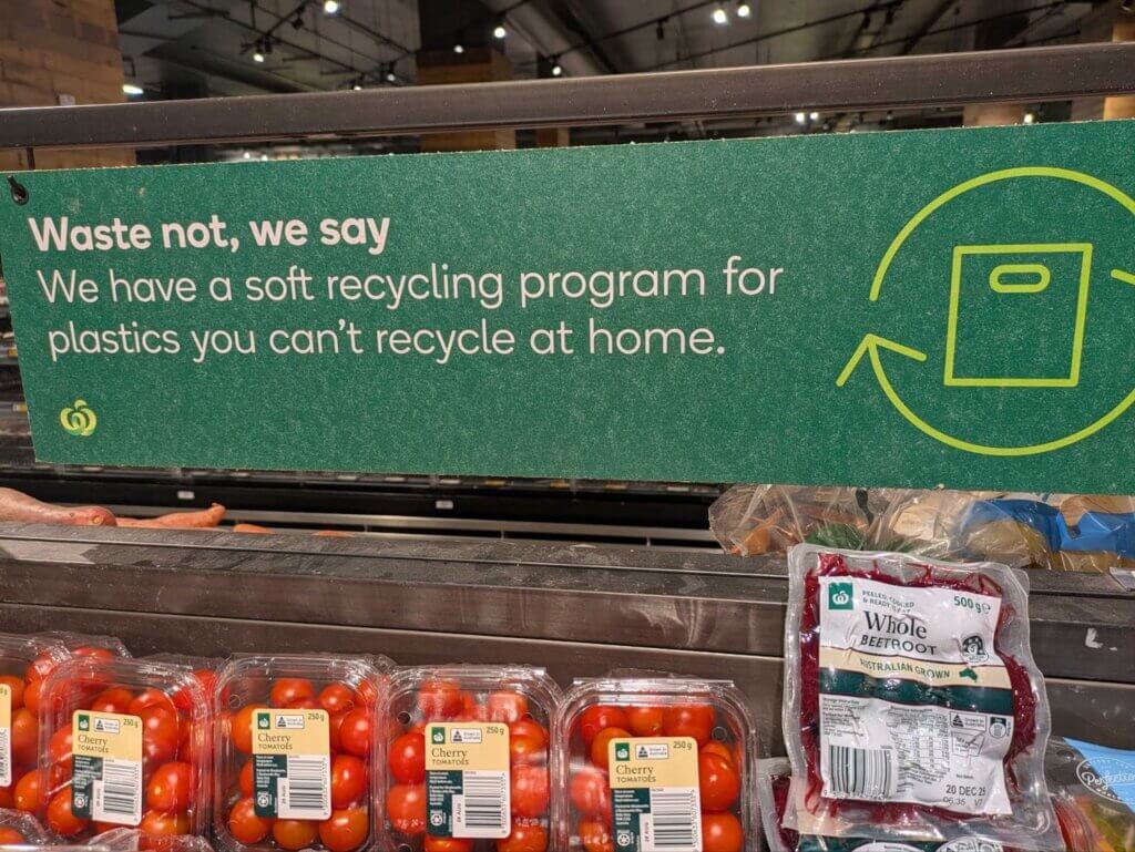 A sign at a Woolworths supermarket touting soft plastic recycling. 